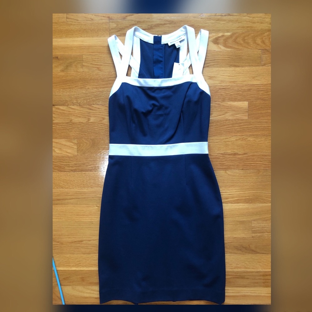 Navy blue dress with white piping